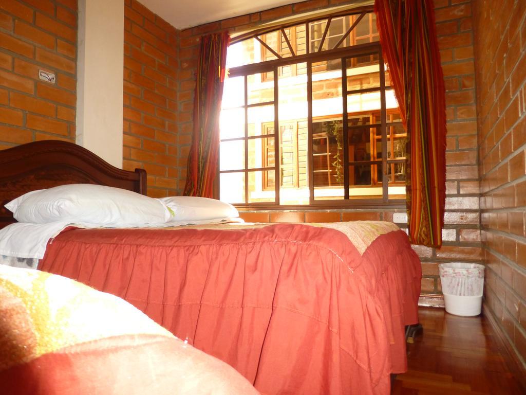 Hostal Nomada Baños Exterior foto