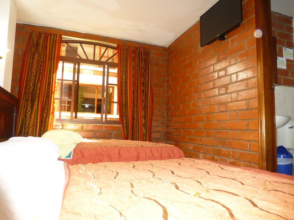 Hostal Nomada Baños Exterior foto